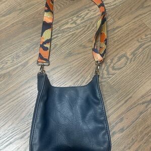 - Ah’dorned vegan leather navy blue crossbody Bag with non-branded strap